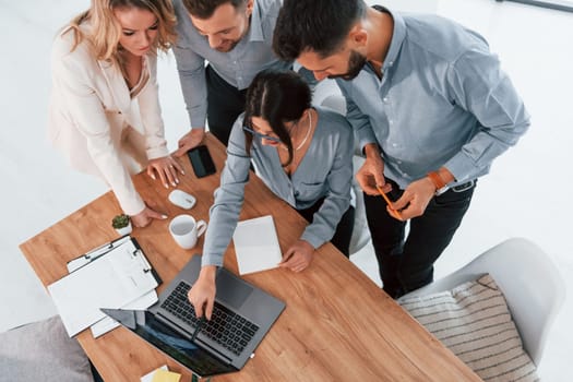 Top view of business people that working by using laptop.