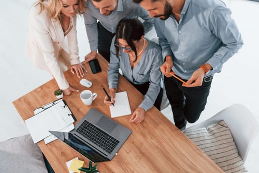 Top view of business people that working by using laptop.