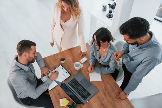 Top view of business people that working by using laptop.