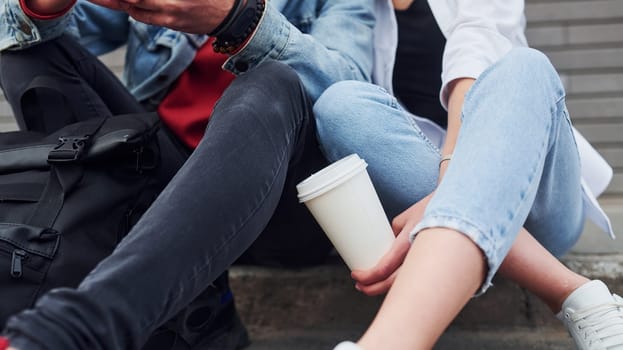 Close up view of man with woman in casual clothes that outdoors together. Conception of friendship or relationships.