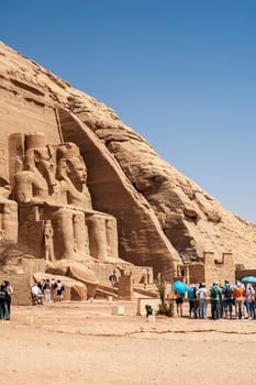 Abu Simbel, Aswan, Egypt - April 18 2008: Tourists visiting the archaeological site of Abu Simbel, Aswan, Egypt