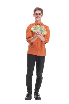 Photo of happy winner man in casual shirt holding a fan of money dollar banknotes isolated over white background