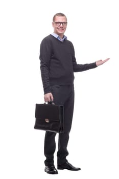 Business man holding his briefcase and wearing glasses and looking at the camera