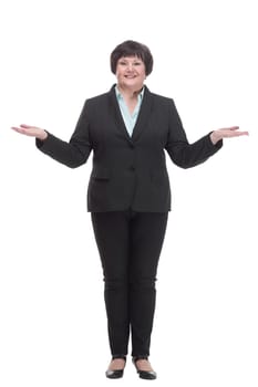 in full growth.Mature business woman in a pantsuit . isolated on a white background.