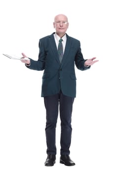 in full growth. personable business man with a digital tablet. isolated on a white background.