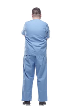 rear view. a male medic in a blue uniform . isolated on a white background.