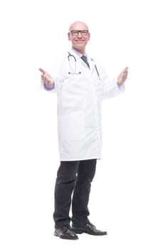 in full growth. senior doctor with a stethoscope. isolated on a white background.
