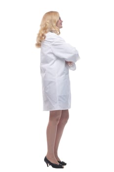 side view. smiling female medic looking at you . isolated on a white background.