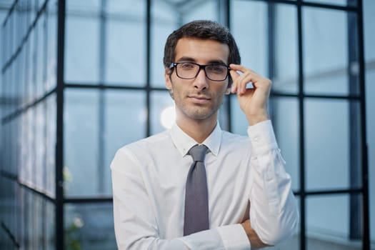 Portrait of handsome mature businessman wearing eyeglasses