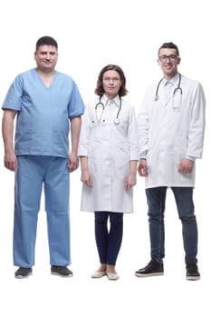 in full growth.a group of medical colleagues standing together. isolated on a white background.