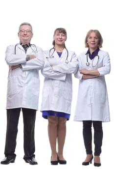 Medical team wearing white coat looking at camera, smiling