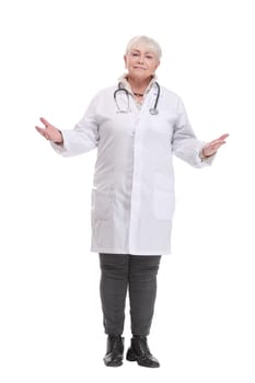 Serious medical doctor woman with stethoscope and hands in pockets. Isolated over white background