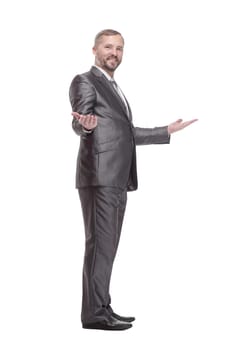 in full growth. handsome business man. isolated on a white background.