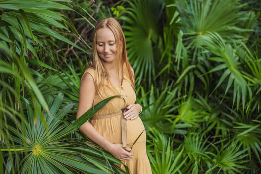 Pregnant woman walks in park at evening. Family enjoying pregnancy. The concept of Mother's Day and Women's Day.