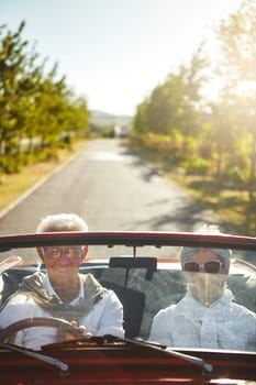 Going wherever the road takes us. a senior couple going on a road trip