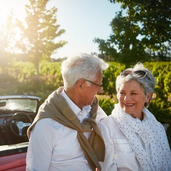 Having lots of memorable moments along the way. a senior couple going on a road trip