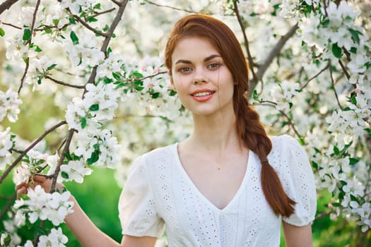 Spring woman in summer dress walking in park. High quality photo