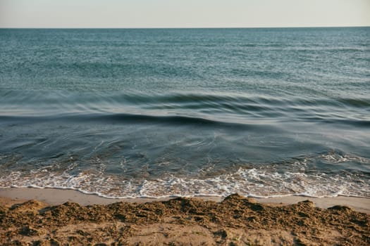 peaceful, calm seascape at sunset in sunny weather. High quality photo