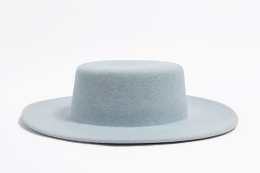 Side view stilish summer blue hat for women, isolated white background.
