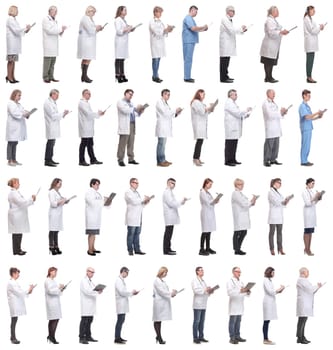 full length group of doctors with notepad isolated on white background