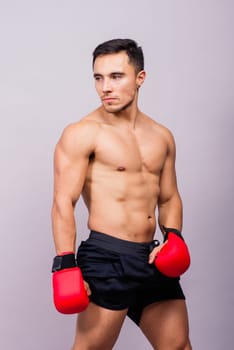 Training, young man and boxer with boxing gloves for a competition, prepare for match