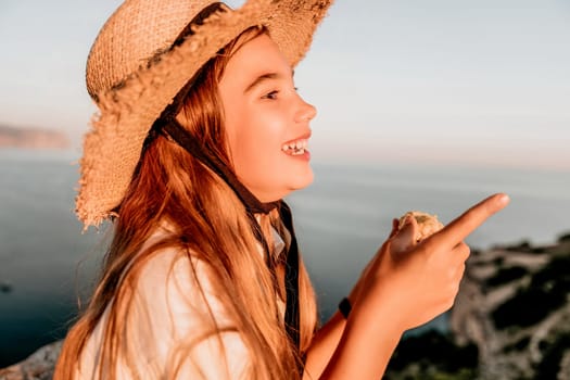 Portrait of young beautiful girl eating corn. Snacking on the sea