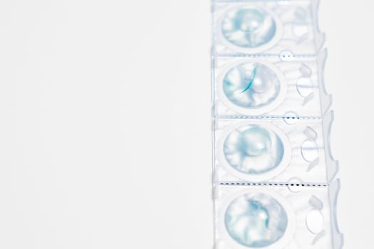 Package of contact eyes on the white background with copy space.