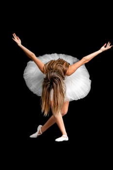 portrait of a ballerina in a pose, black background. High quality photo