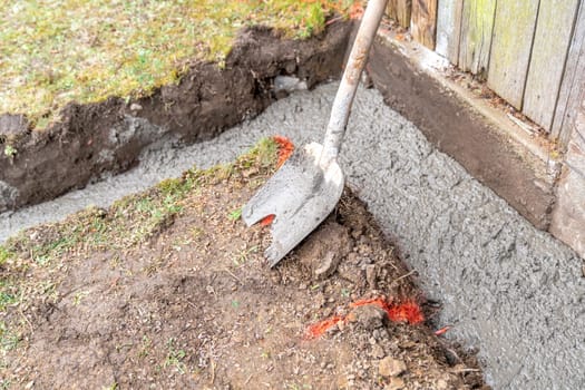 concrete foundation in the ground for building construction.