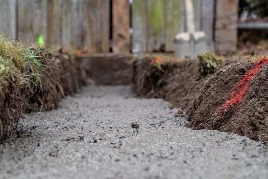 concrete foundation in the ground for building construction.