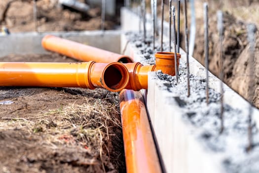 PVC plastic pipe for sewerage in the ground.