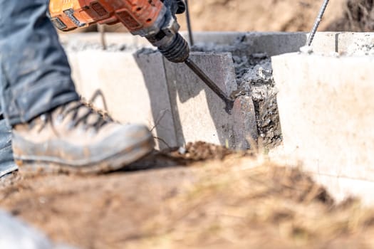 demolition of concrete with an electric hammer.