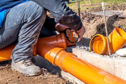 PVC plastic pipe for sewerage in the ground.