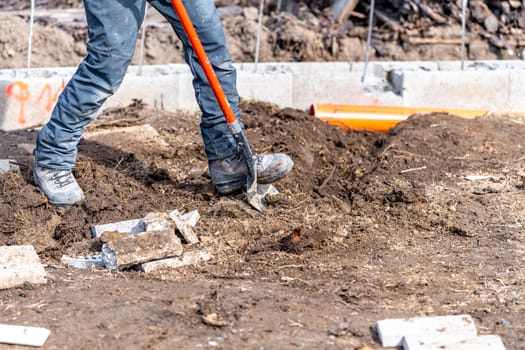 excavated from the ground with a shovel for a sewerage fund made of PVC pipes. High quality photo