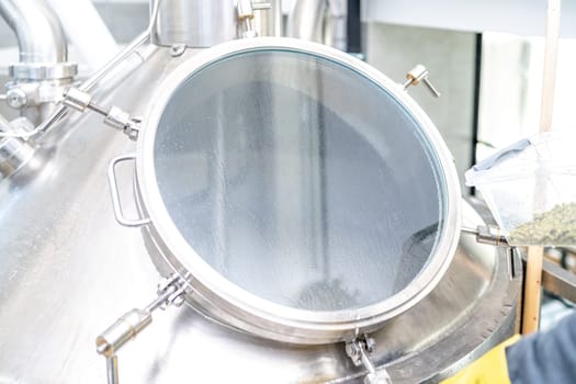 stainless steel boiler for brewing beer in a brewery. High quality photo