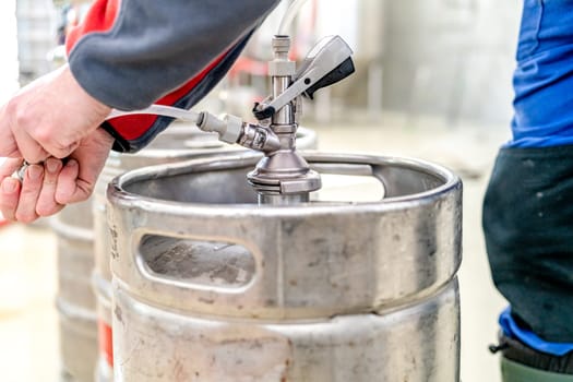 beer keg connected in pub. beer keg head.