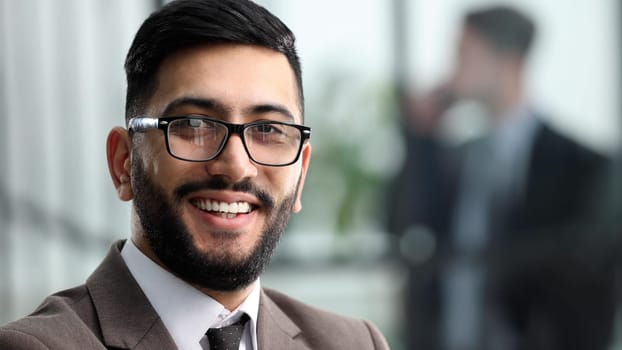 Close-up portrait of a dedicated young businessman