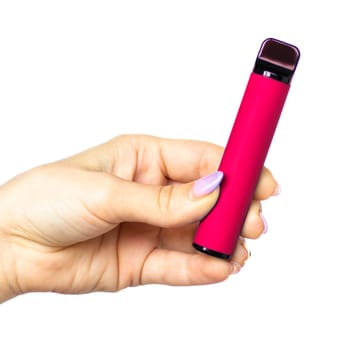 Female hand holds electronic cigarette on a white background. Disposable electronic cigarette. concept of modern smoking, vaping and nicotine. copyspace. Alternative way of smoking vaping device