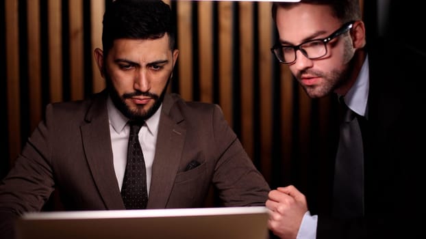 Two business men sitting in the office, meeting or job interview.