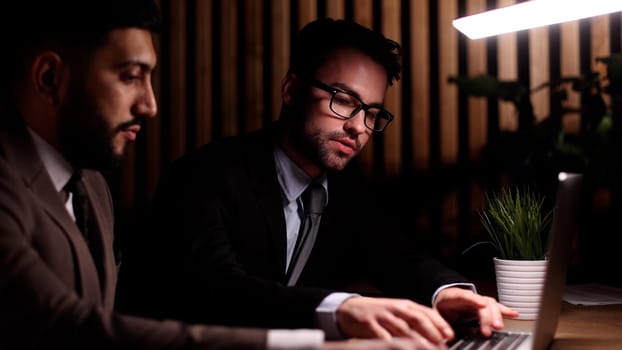 business colleagues sitting at the table in the office