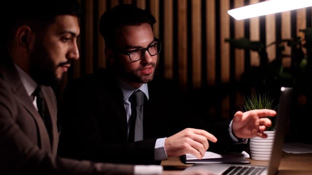 business colleagues sitting at the table in the office