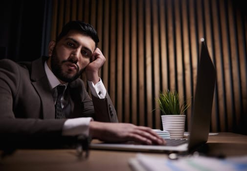 Man working on a laptop in the office