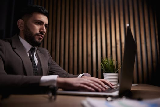 Man working on a laptop in the office