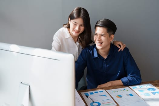 Startup family business, husband and wife discussing financial affairs, investing, making profit, tax deduction from trading using computer and investment budget paperwork working.