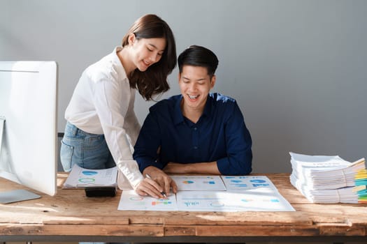 Startup family business, husband and wife discussing financial affairs, investing, making profit, tax deduction from trading using computer and investment budget paperwork working.