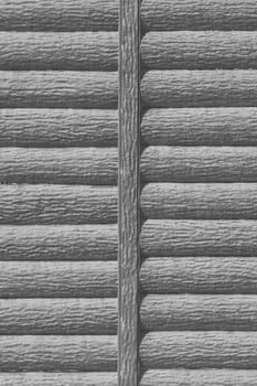 Grey wooden partition wall fence monochrome modern interior logs texture board background plank gray.