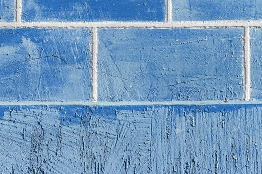 Blue paint wall brick blocks exterior facade texture background.