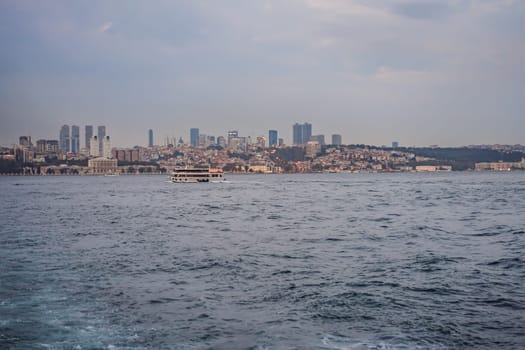 Muslim architecture and water transport in Turkey - Beautiful View touristic landmarks from sea voyage on Bosphorus.