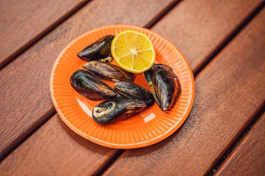 Heap of mussels in shells stuffed with rice. Turkish food. Istanbul, Turkey.