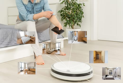 people, housework and technology concept. robot vacuum cleaner